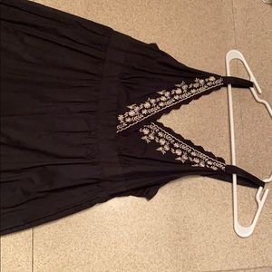 Black dress with white embroidery